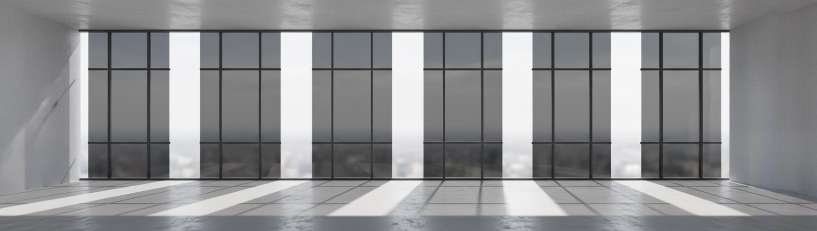 Facciata continua in vetro fotovoltaico di un edificio direzionale